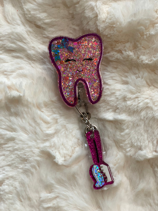 PURPLE GLITTER TOOTH WITH TOOTHBRUSH CHARM ACRYLIC I.D BADGE REEL